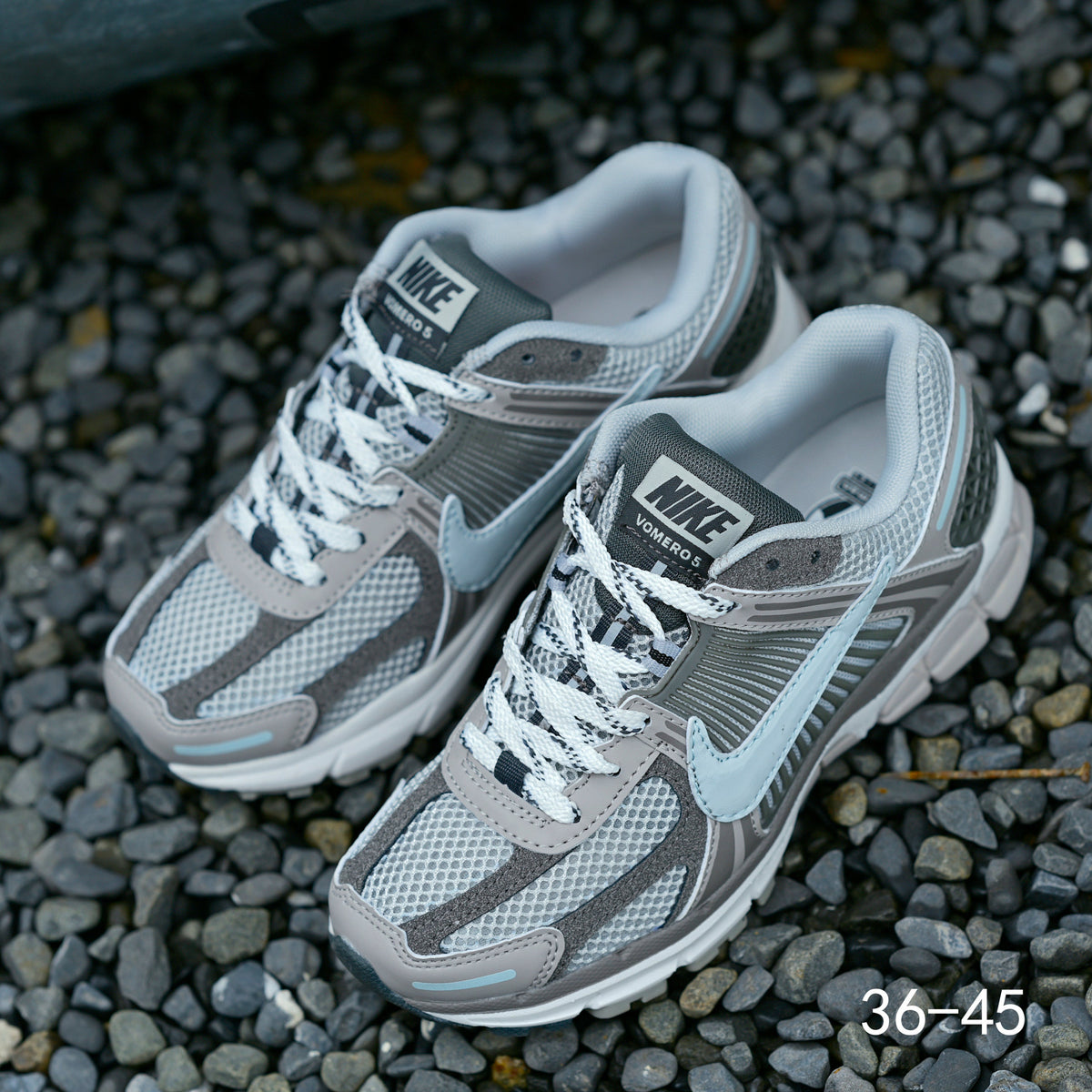 Grey Nike Air Zoom Vomero 5 Running Shoes - product image from the listing.