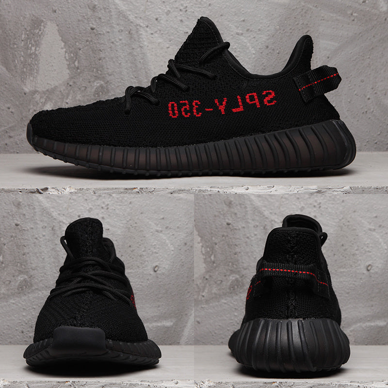 Yeezy Boost 350 V2 Black Knit Trainers with Red Accents - product image from the listing.