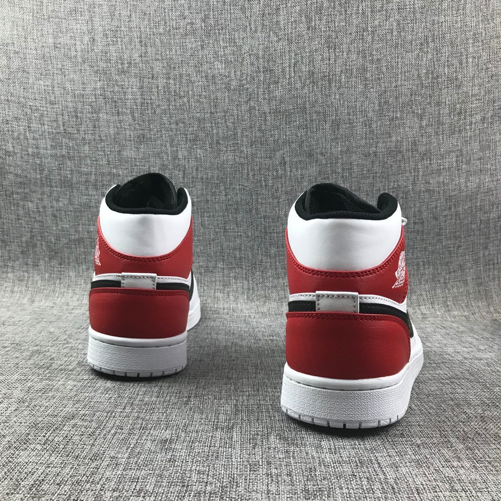Air Jordan 1 Mid Sneakers in White Red 554724-116 - product image from the listing.