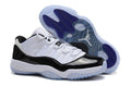 Air Jordan 11 Low Basketball Sneakers in White Black - product image from the listing.