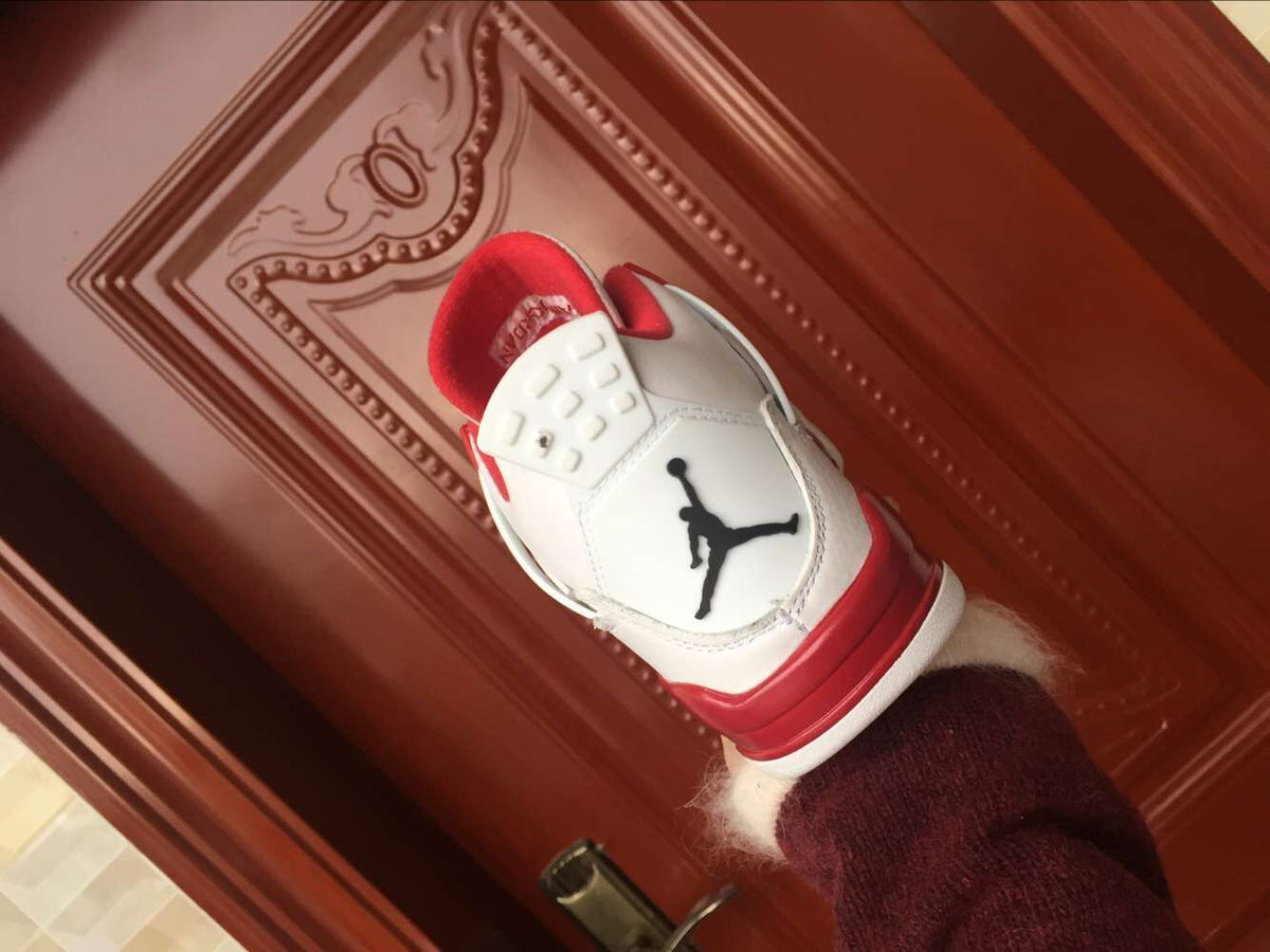 Jordan 4 Retro High-Top Sneakers in White and Red - product image from the listing.