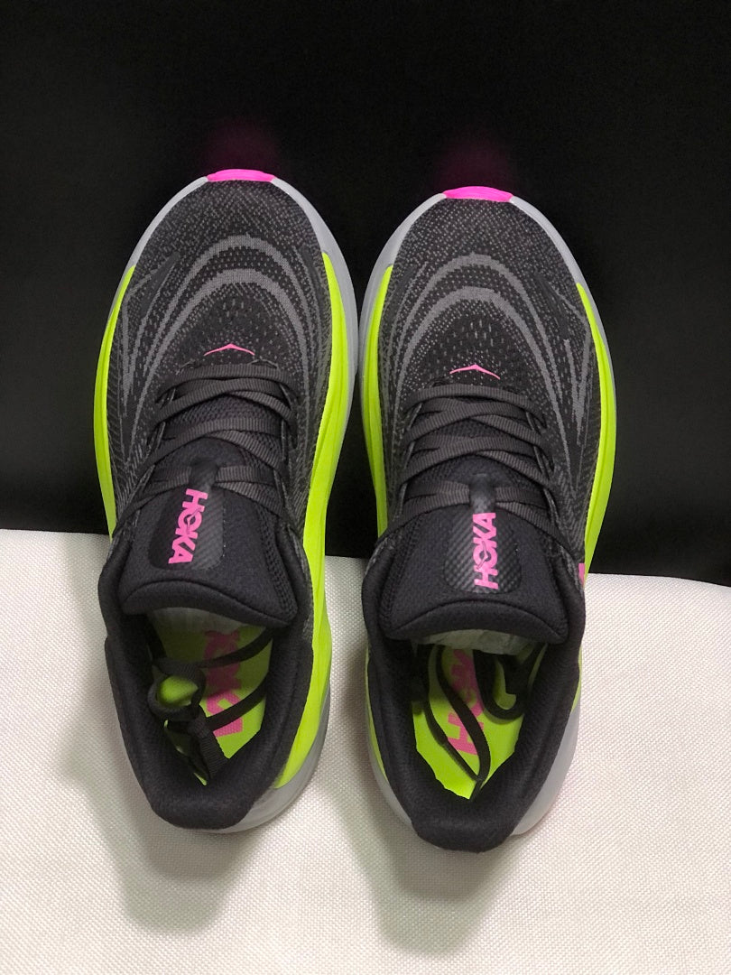 HOKA Arahi 8 Running Shoes, Black and Neon in Yellow - product image from the listing.