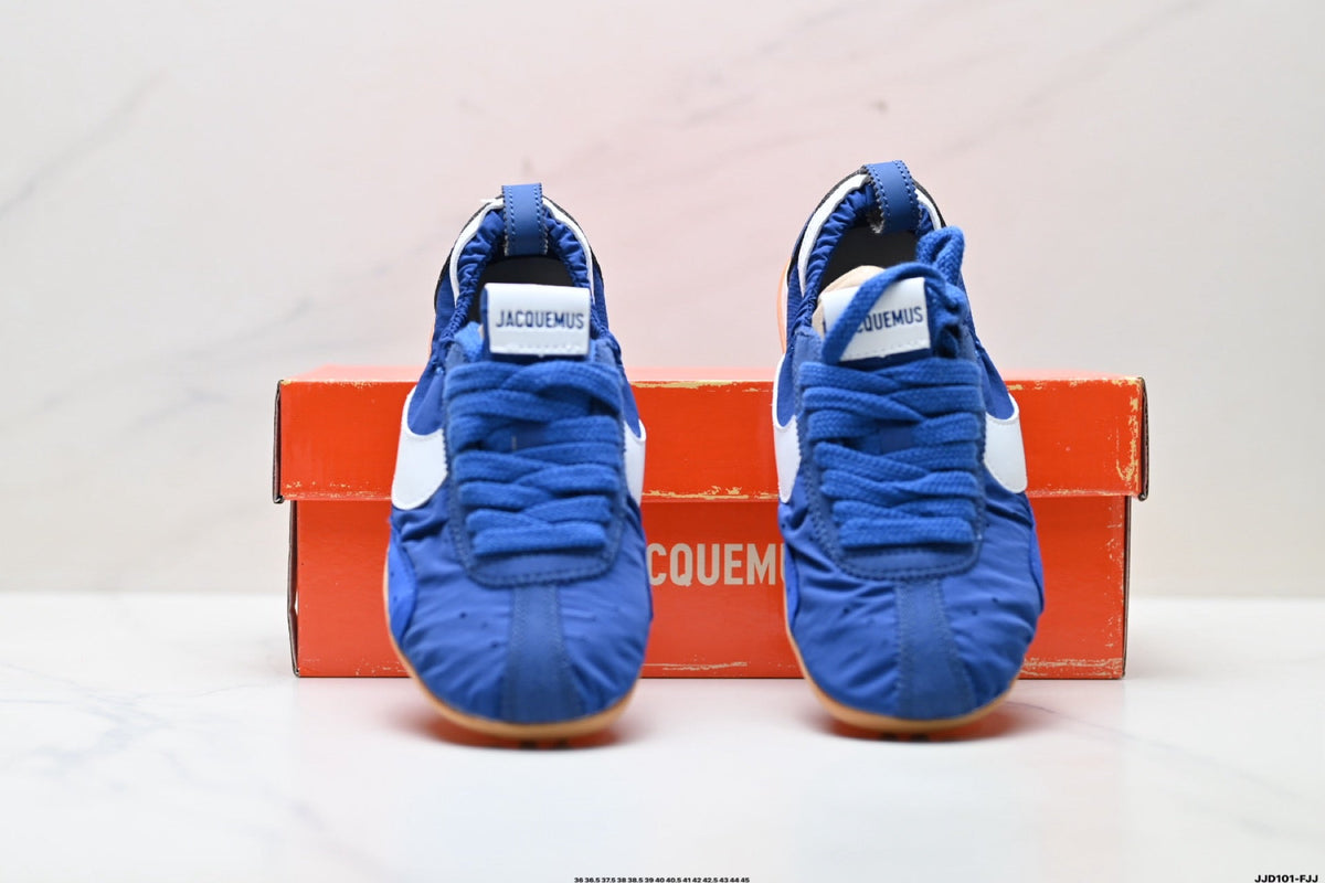 Jacquemus x Nike Jacumoon Low-Top Sneakers, in Blue and White - product image from the listing.