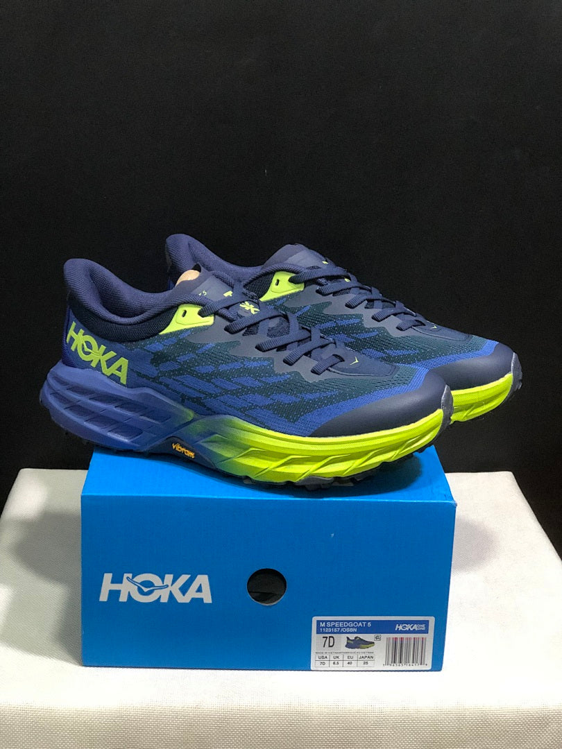 HOKA Speedgoat 5 Trail Running Shoes, in Navy and Lime - product image from the listing.