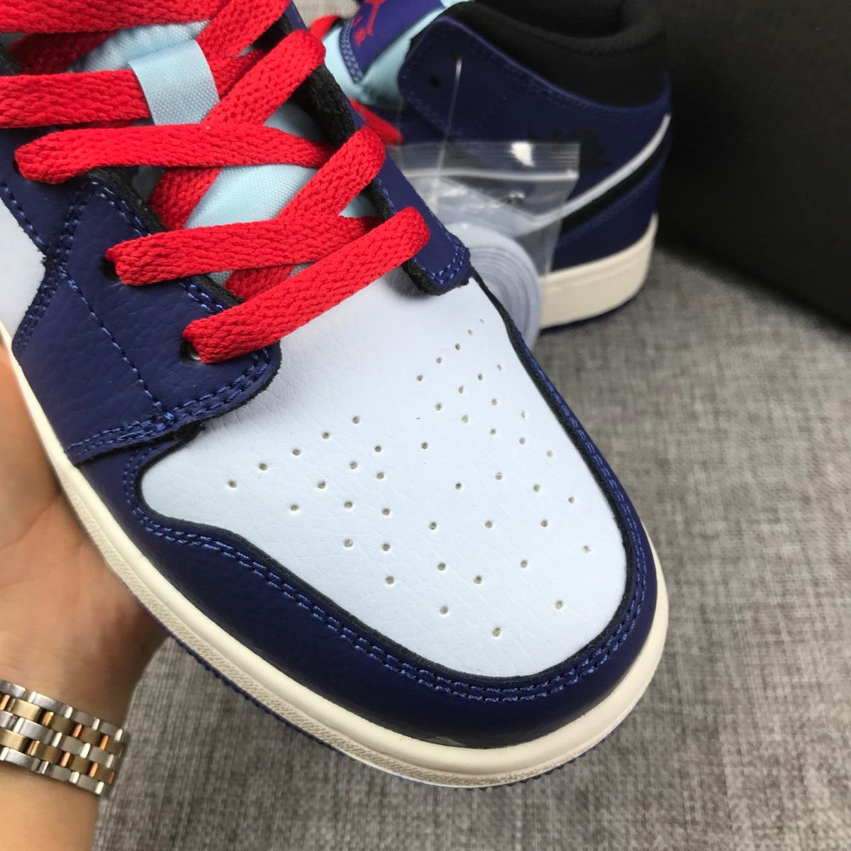 Air Jordan 1 Mid White, Sneakers in Black and Purple - product image from the listing.
