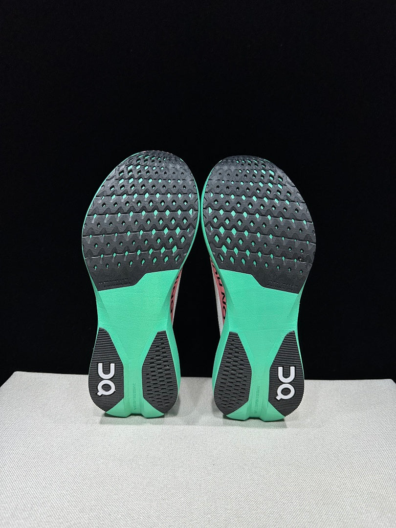 On Cloudboom Strike LS Running Shoes, in White Pink Green - product image from the listing.