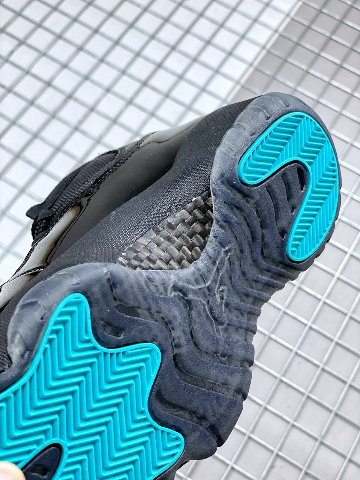 Air Jordan 11 Retro Gamma Black Sneakers 378037-006 - product image from the listing.