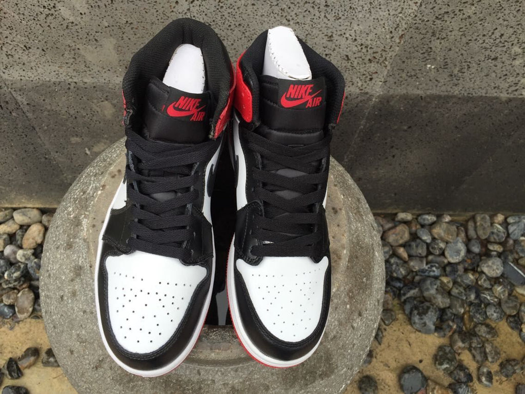 Jordan 1 High Sneakers in Black White Red - product image from the listing.