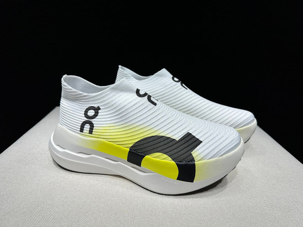 On Cloudboom Strike LS Running Shoes in White Lime - product image from the listing.