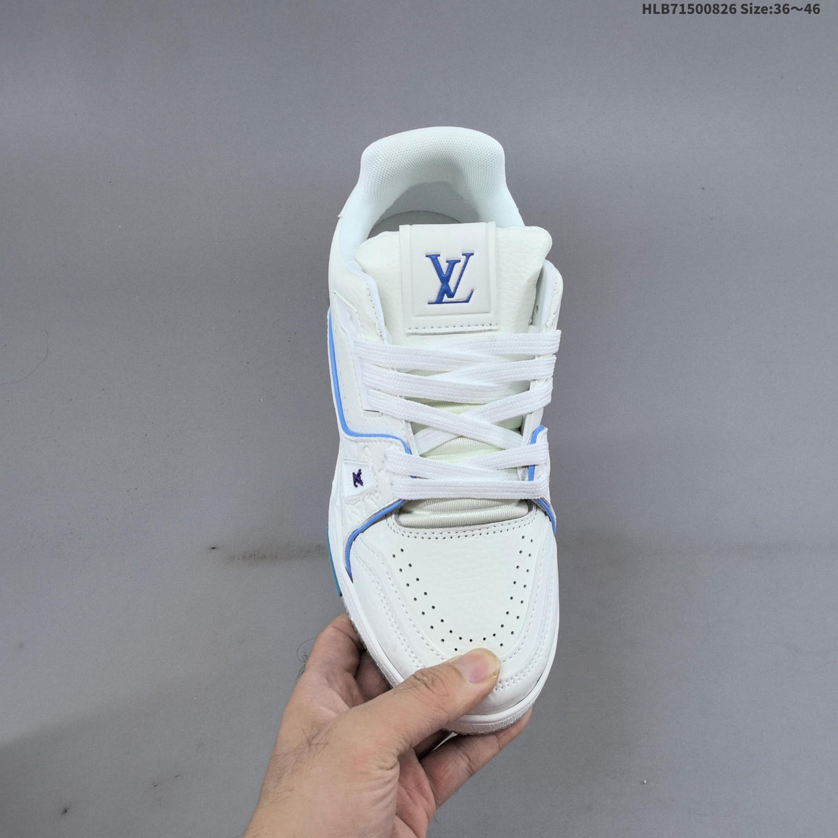 Louis Vuitton White Low-Cut Sneakers with Blue Accents - product image from the listing.