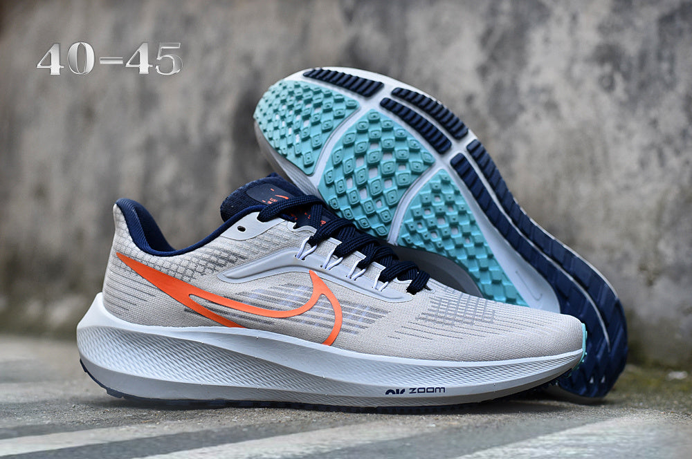 Nike Air Zoom Pegasus Running Shoes, in Grey and Navy - product image from the listing.