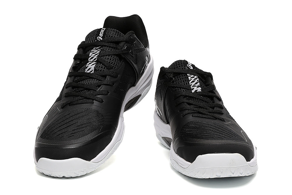 ASICS Black and White Court Trainers - product image from the listing.