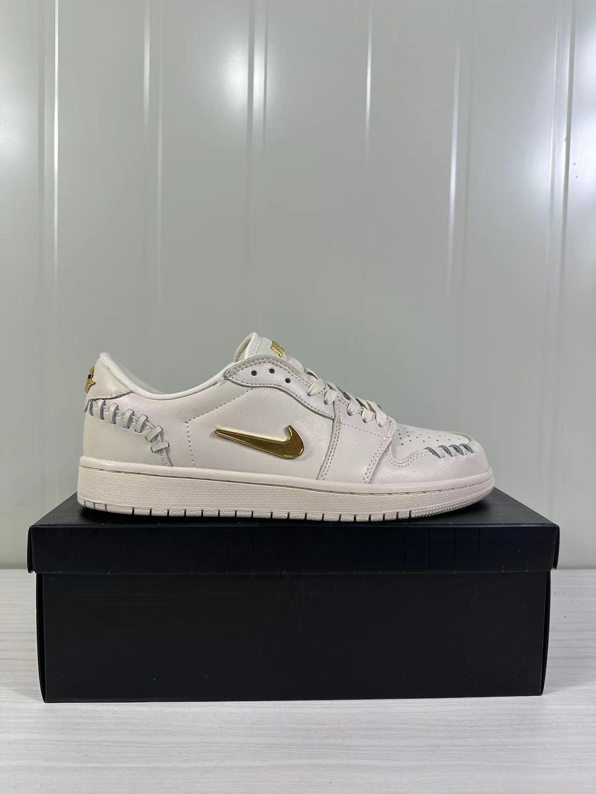Air Jordan 1 Low White Gold FN5032-200 - product image from the listing.
