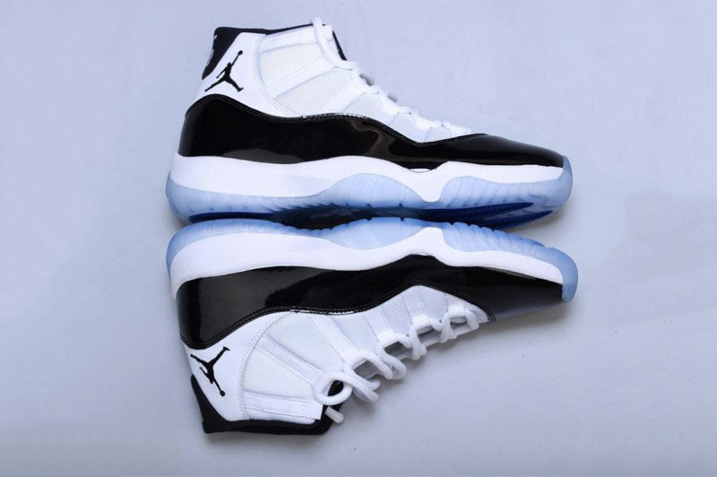 Air Jordan 11 Concord Black White Sneakers - product image from the listing.