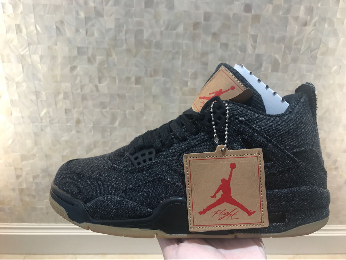 Jordan 4 Retro Levi's Sneakers in Black Denim A02571-001 - product image from the listing.
