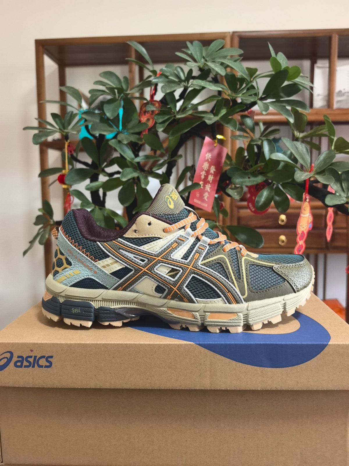ASICS GEL-Kayano 14 K5 Sneakers in Blue and Brown - product image from the listing.