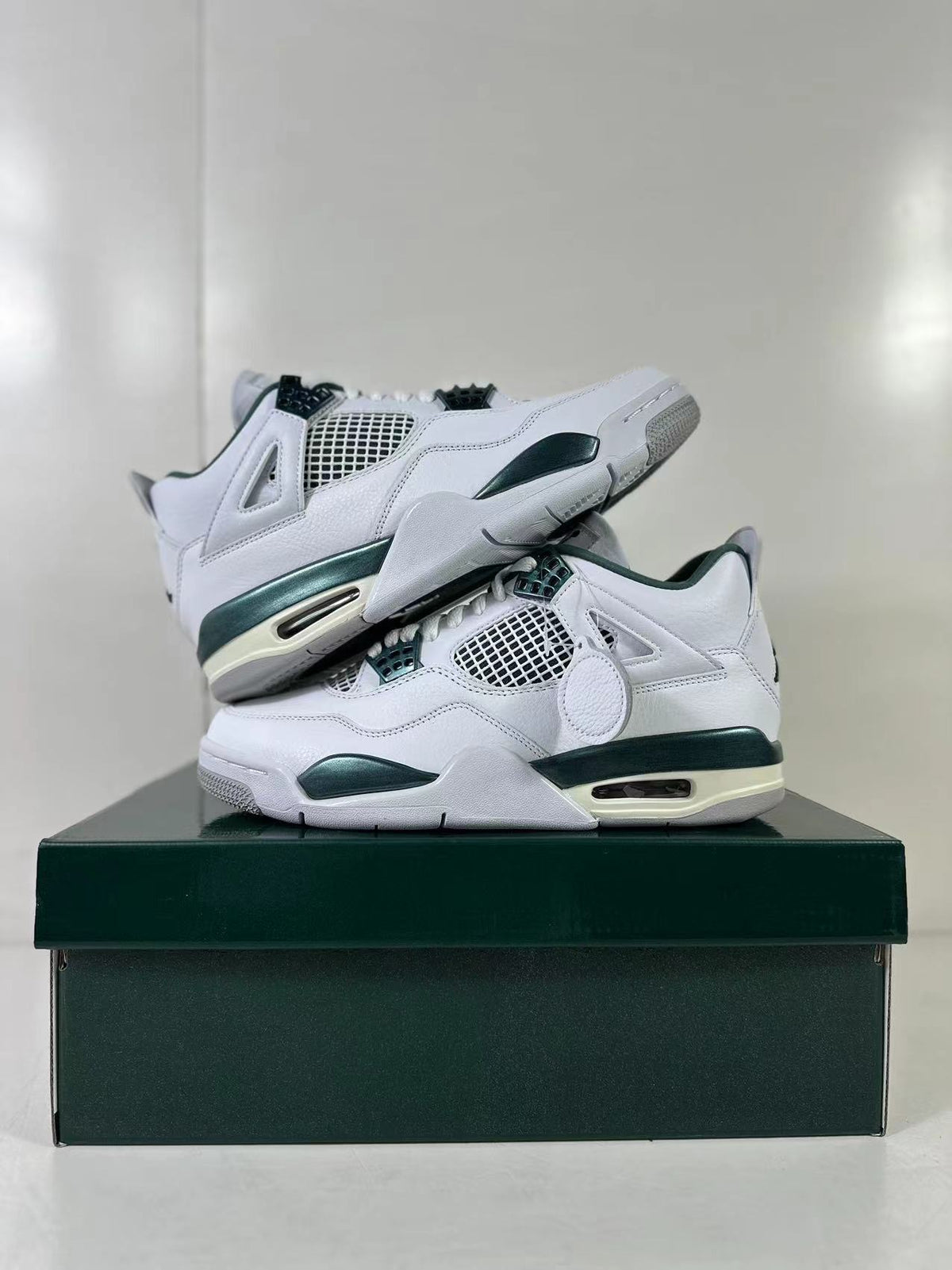 Air Jordan 4 Retro Bucks White Green Sneakers FQ8138-103 - product image from the listing.