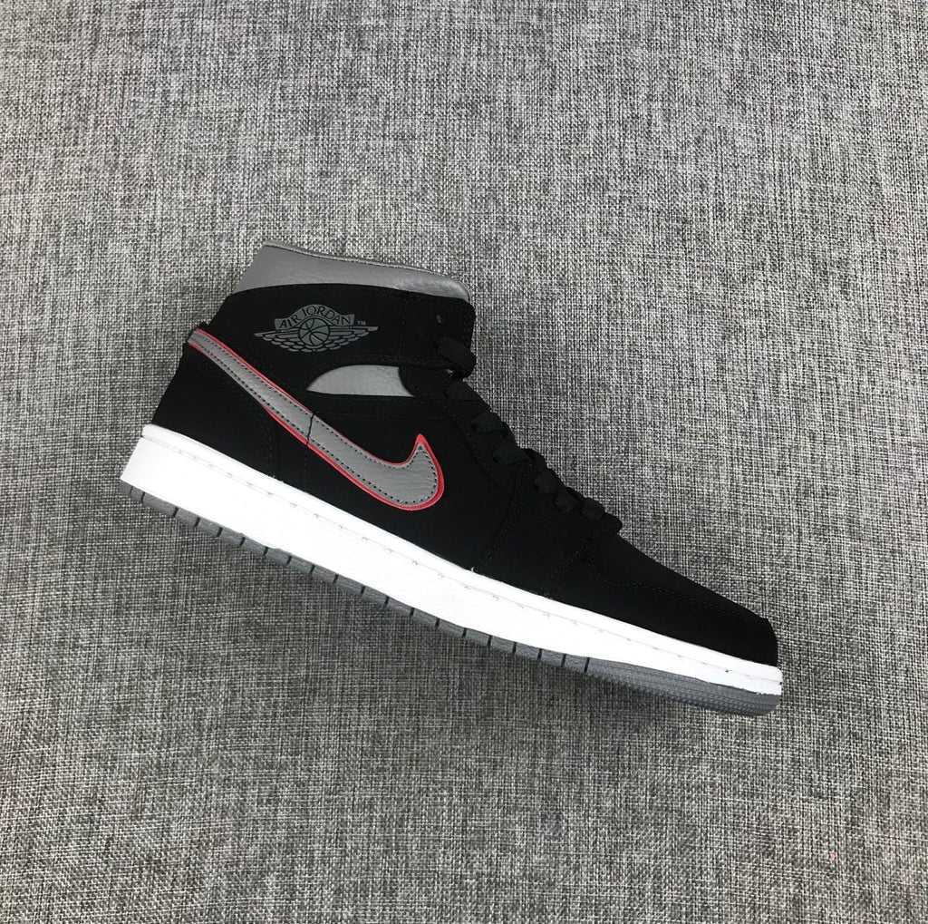 Air Jordan 1 Mid Sneakers in Black Grey Red 554724-060 - product image from the listing.