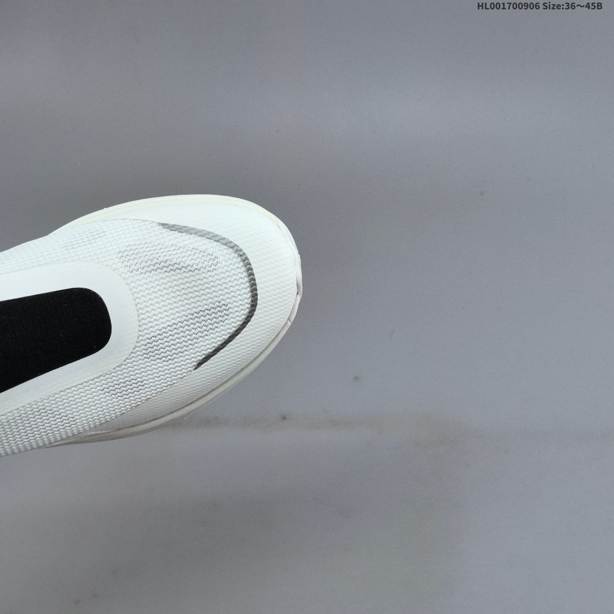 Descente Dualis Primer Slip-On Sneakers, in White and Black - product image from the listing.