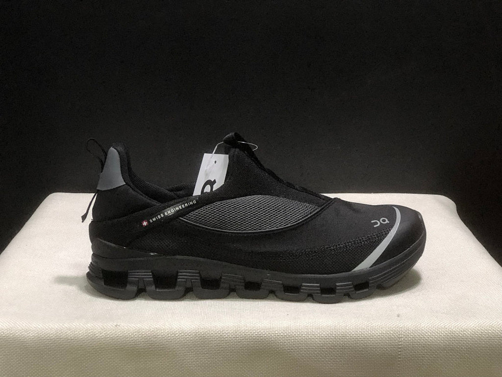 On Cloud 4 Coast Black Slip-On Trainers - product image from the listing.