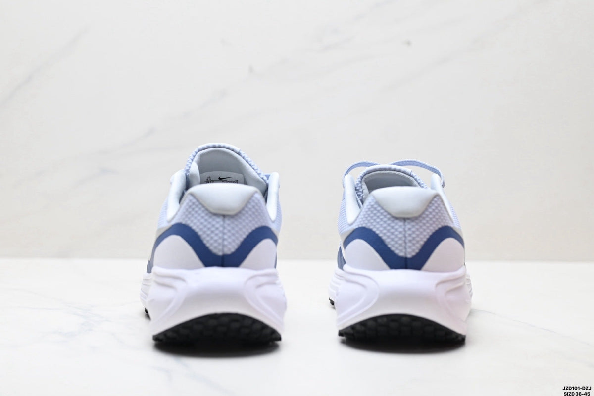 Nike Revolution 8 Running Shoes, in Light Blue and Navy - product image from the listing.