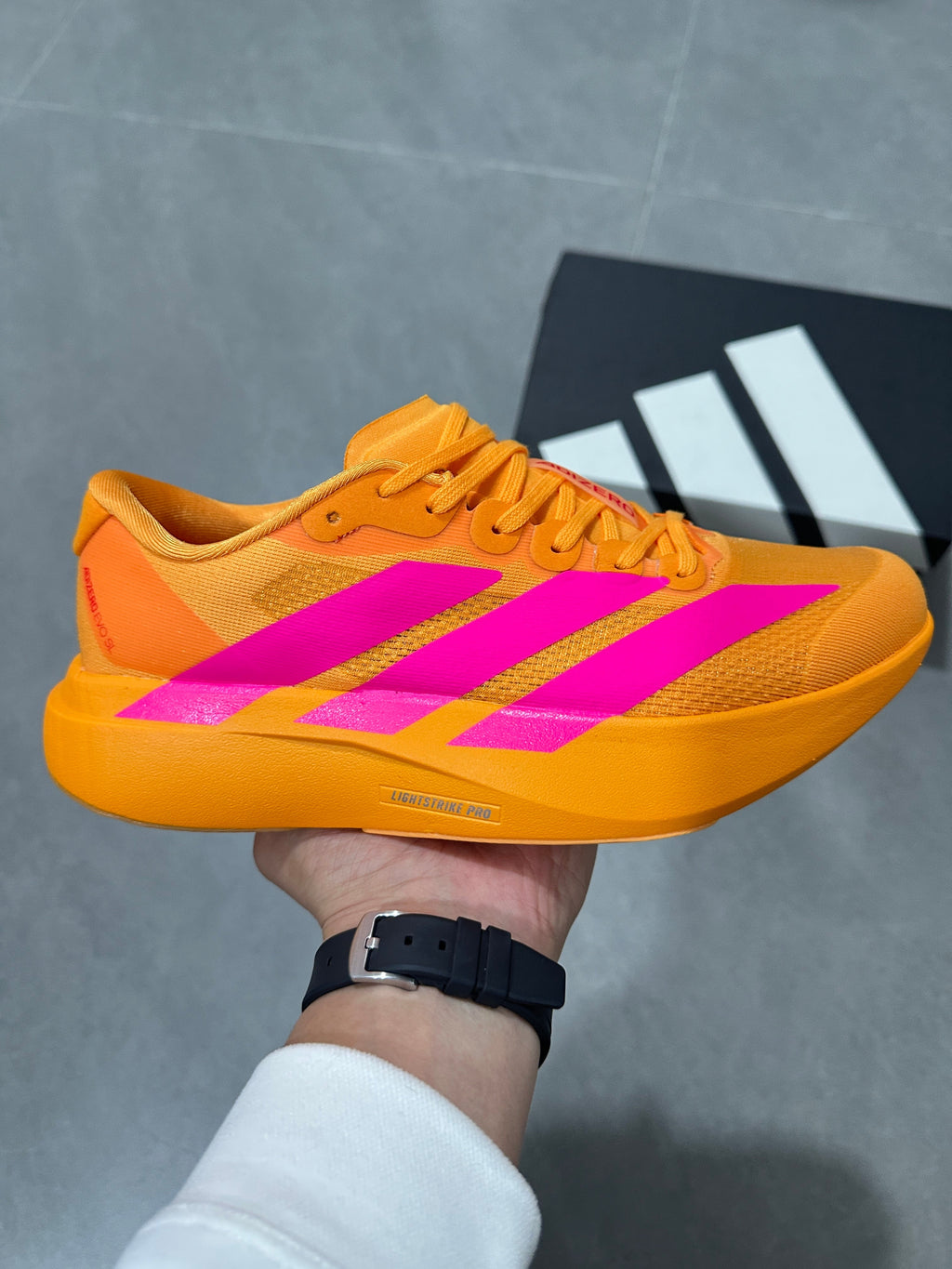 adidas Adizero Lightstrike Pro Running Shoes in Gold Pink - product image from the listing.