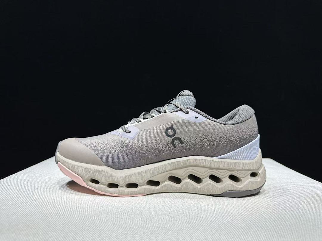 On Cloudsurfer Trail 2 Waterproof Trail Shoes Pink/Brown in Grey - product image from the listing.