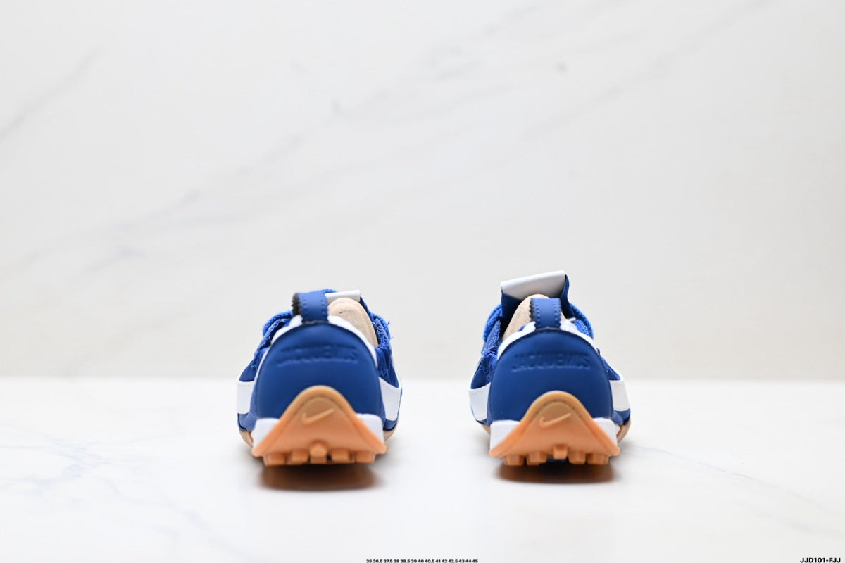 Jacquemus x Nike Jacumoon Low-Top Sneakers, in Blue and White - product image from the listing.