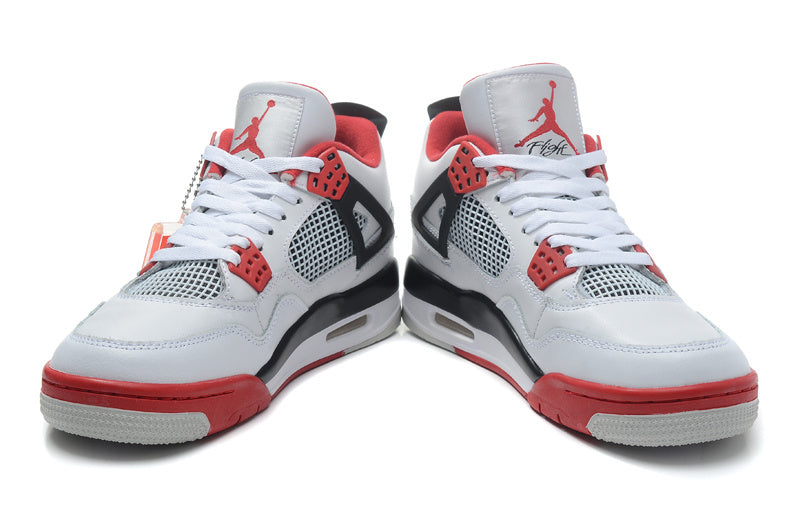 Air Jordan 4 Retro High-Top Sneakers in White and Red - product image from the listing.