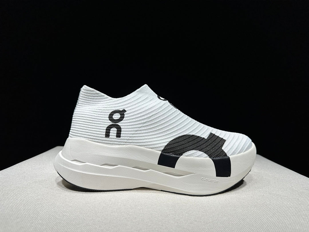 On Cloudboom Strike LS Running Shoes in White Black - product image from the listing.