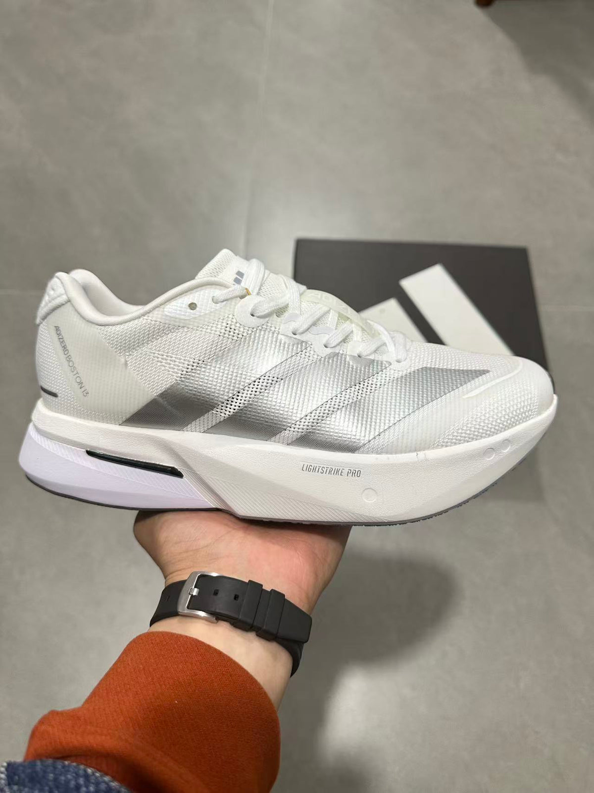 Adidas Adizero Lightstrike Pro Running Shoes in White - product image from the listing.