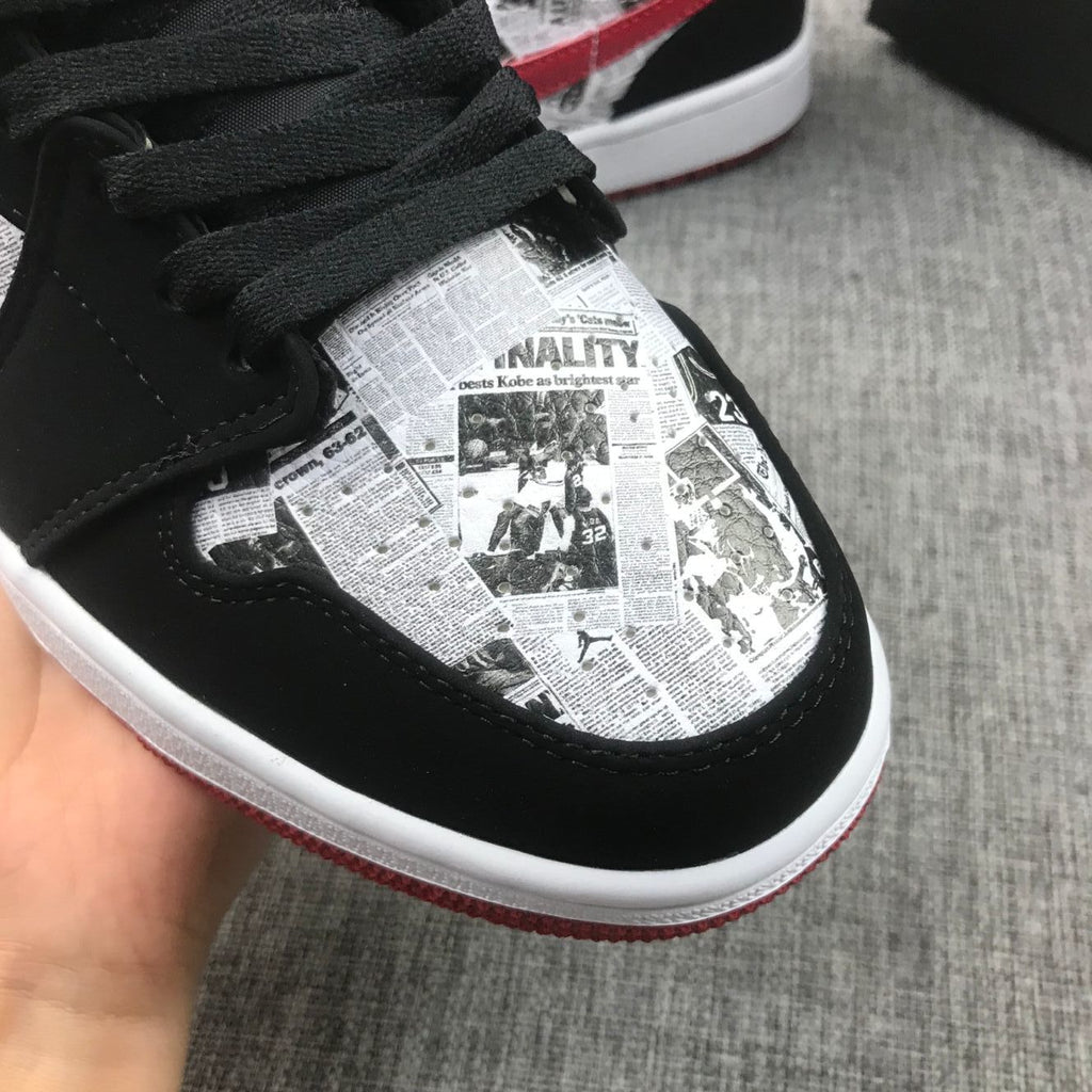 Air Jordan 1 Mid Sneakers in Black Red 852542-061 - product image from the listing.