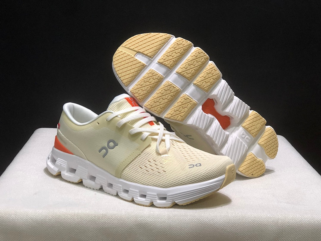 Cream and Orange On Cloud X 4 Sneakers - product image from the listing.