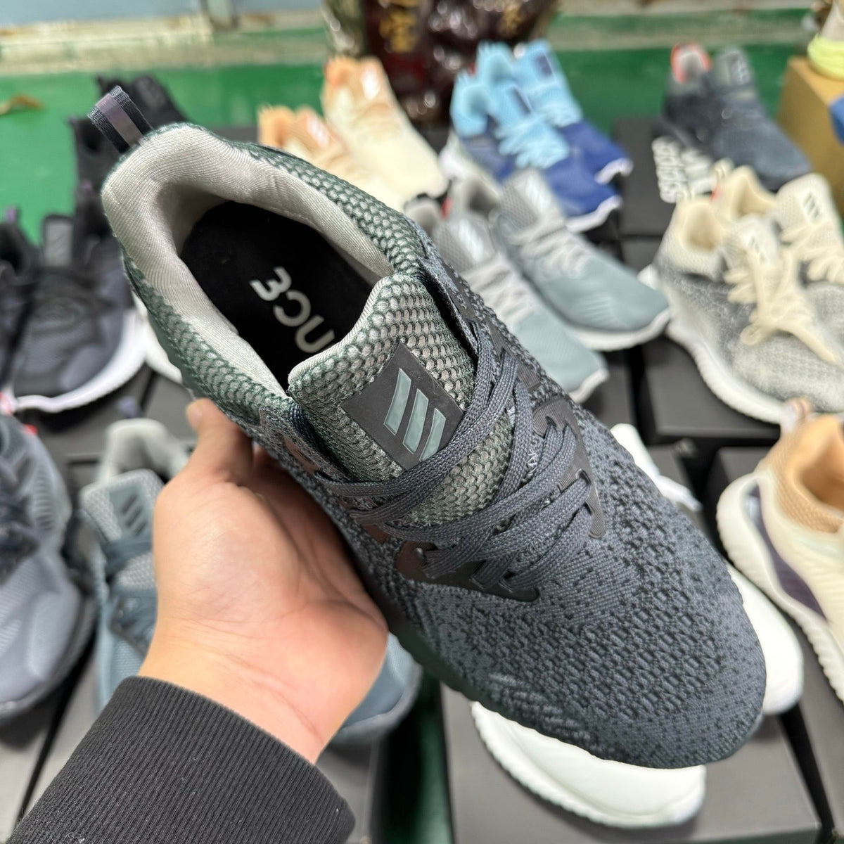 Dark Gray Green adidas AlphaBounce HPC Sneakers - product image from the listing.