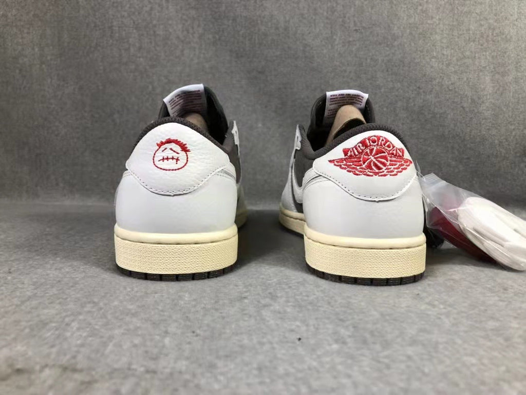 Travis Scott x Air Jordan 1 Low Sneakers in White Brown - product image from the listing.