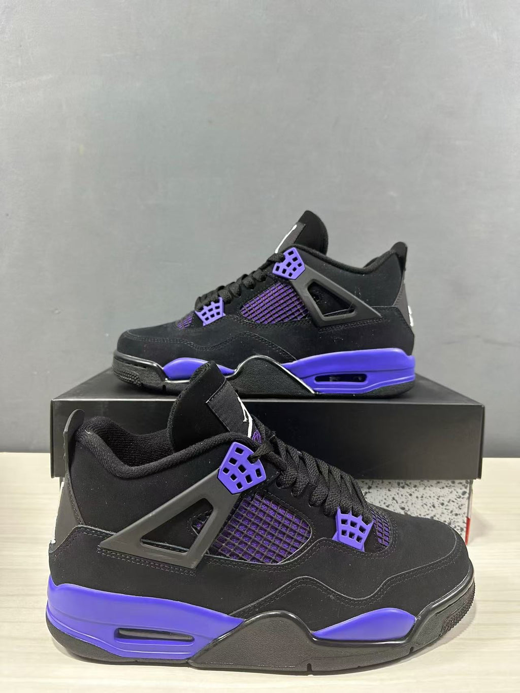 Air Jordan 4 Retro Black Blue Sneakers CT8527-018 - product image from the listing.