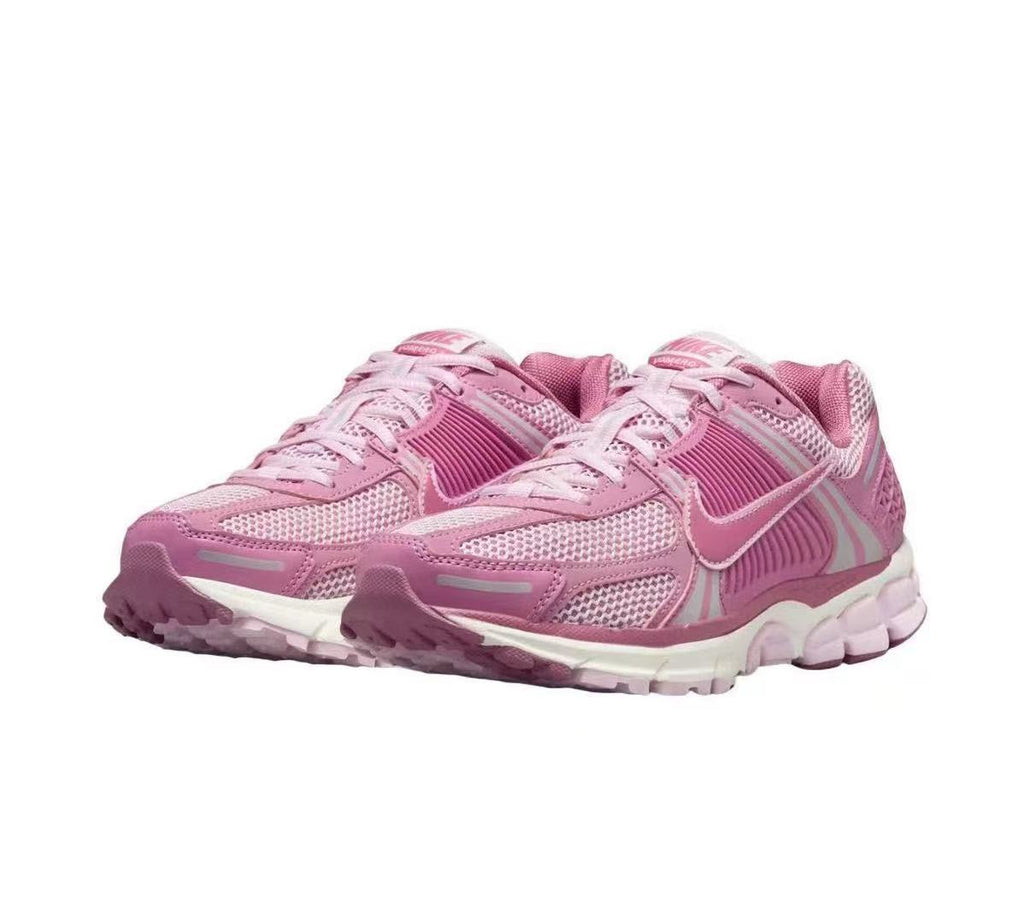 Nike Zoom Vomero 5 Sneakers in Pink and White - product image from the listing.