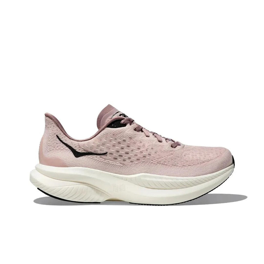 Pink Nike Mach 6 Running Shoes - product image from the listing.