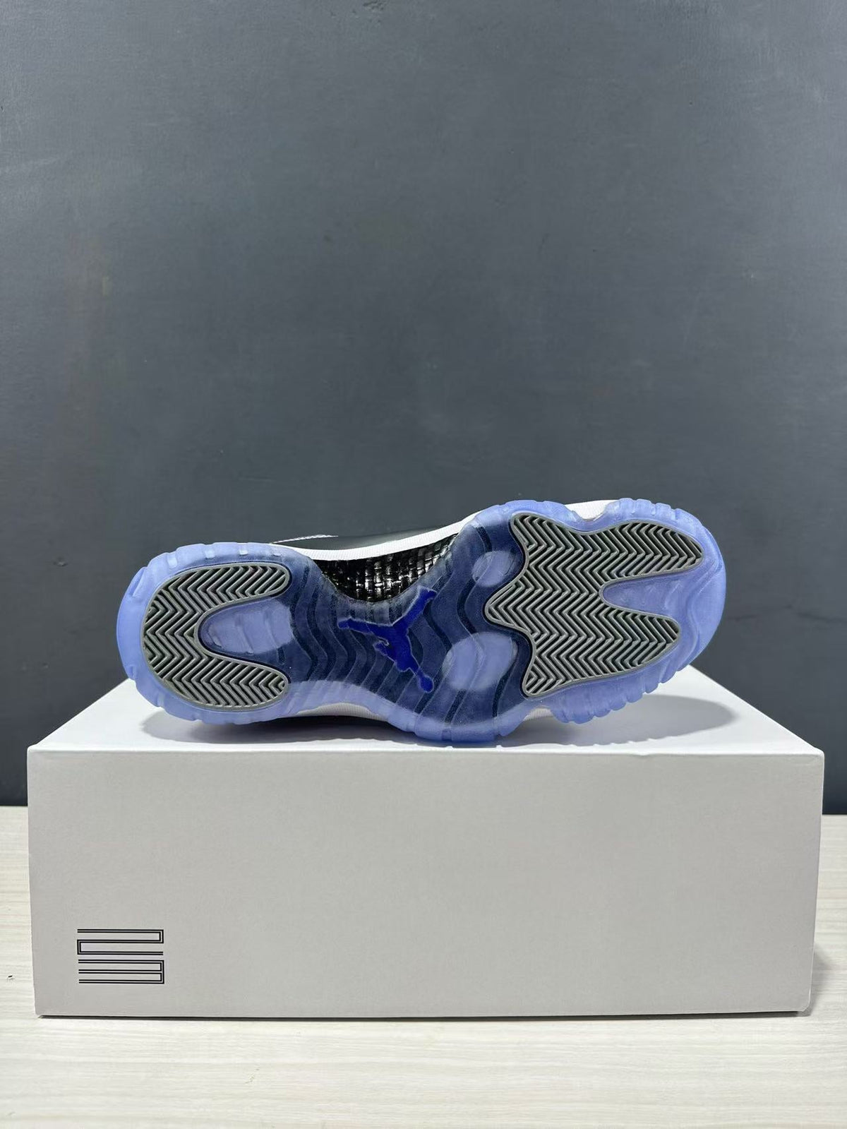 Air Jordan 11 Retro Liquid Silver High-Top Sneakers - product image from the listing.