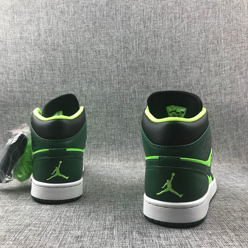 Air Jordan 1 Mid Fluorescent Sneakers in Green 554724-330 - product image from the listing.