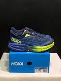 HOKA Speedgoat 5 Trail Running Shoes, in Navy and Lime - product image from the listing.