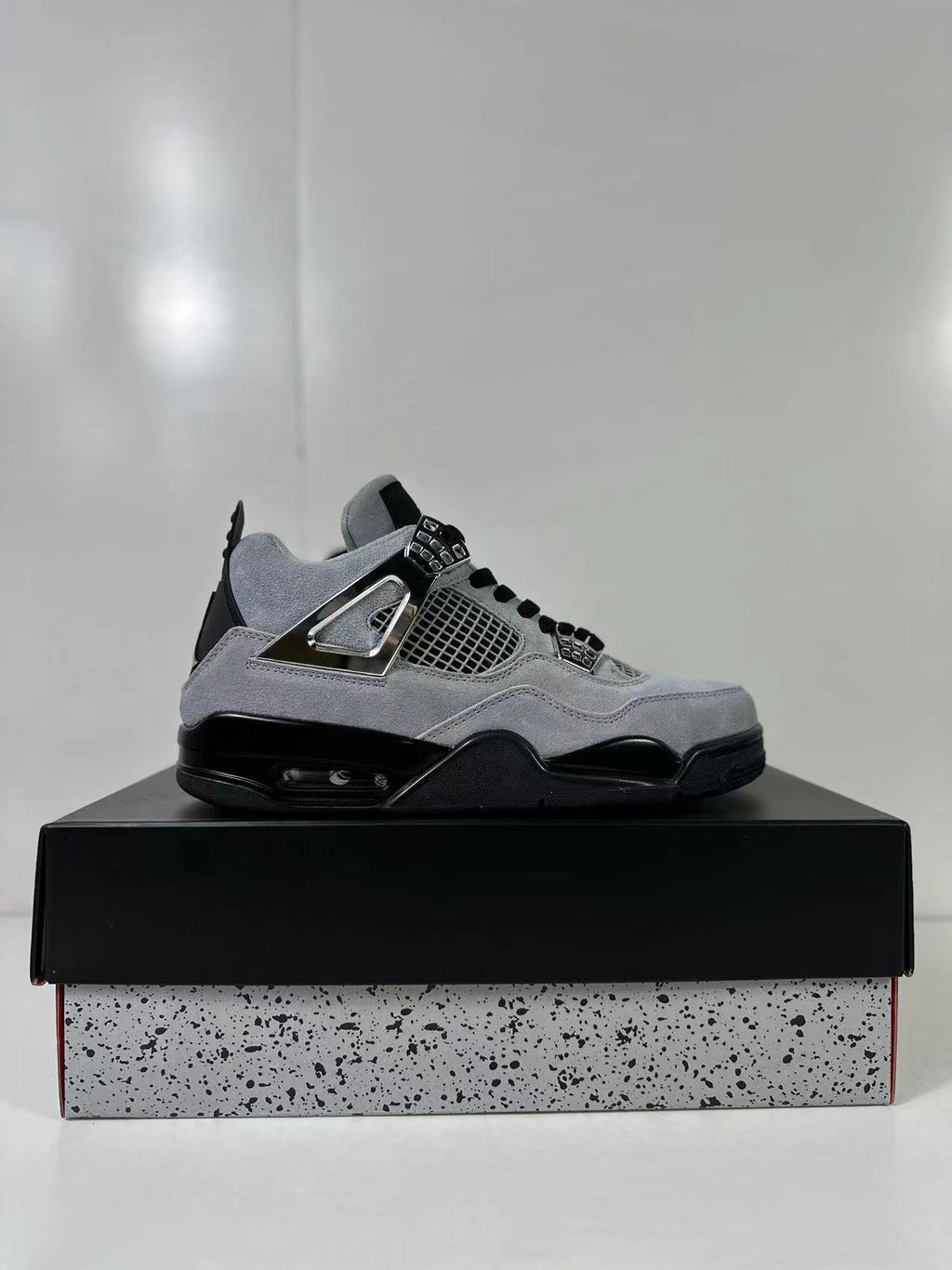 Air Jordan 4 Retro Gray Black Sneakers AQ9129-005 - product image from the listing.