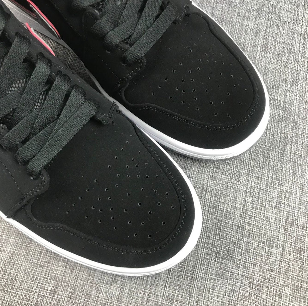 Air Jordan 1 Mid Sneakers in Black Grey Red 554724-060 - product image from the listing.