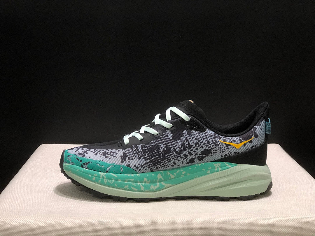 HOKA Speedgoat 6 Trail Running Shoes, in Gray and Teal - product image from the listing.