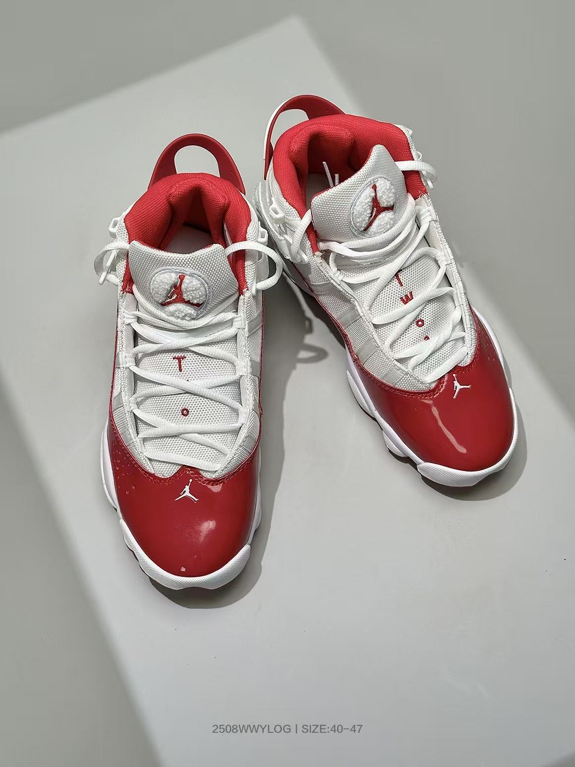 Jordan 6-3 Basketball Sneakers in White and Red - product image from the listing.