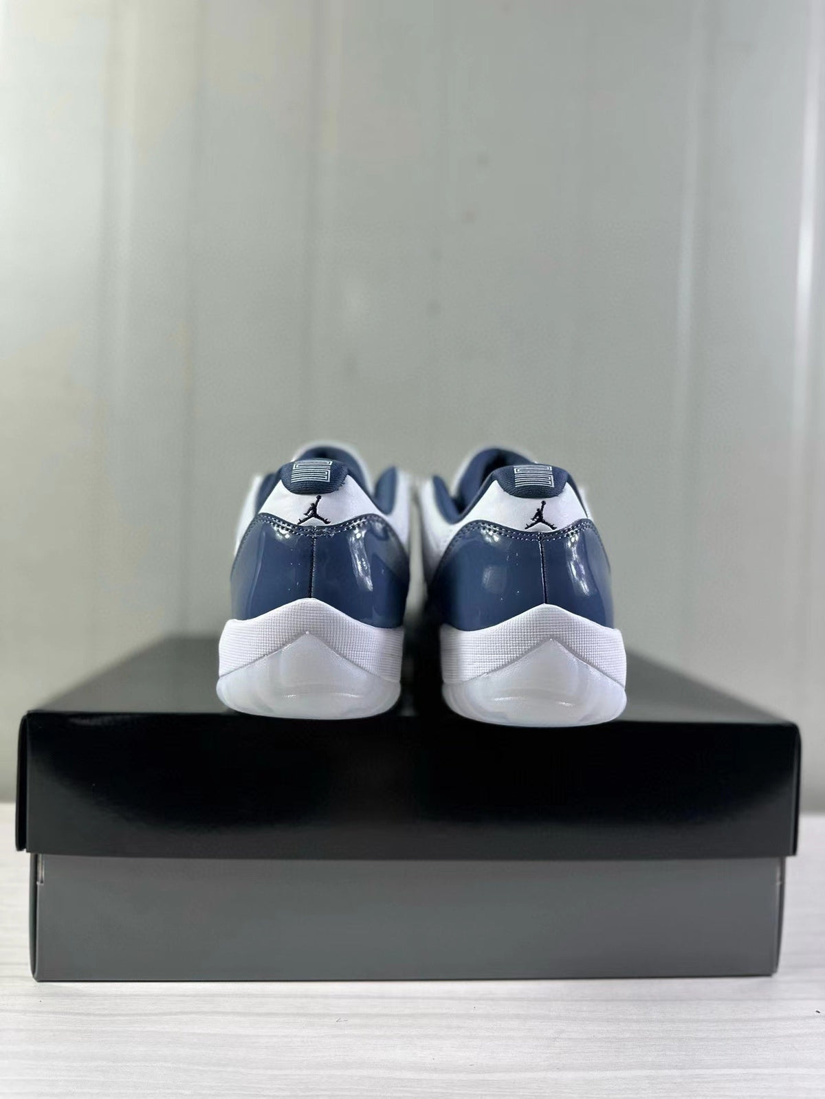 Air Jordan 11 Low Diffused Blue Sneakers FV5104-104 - product image from the listing.