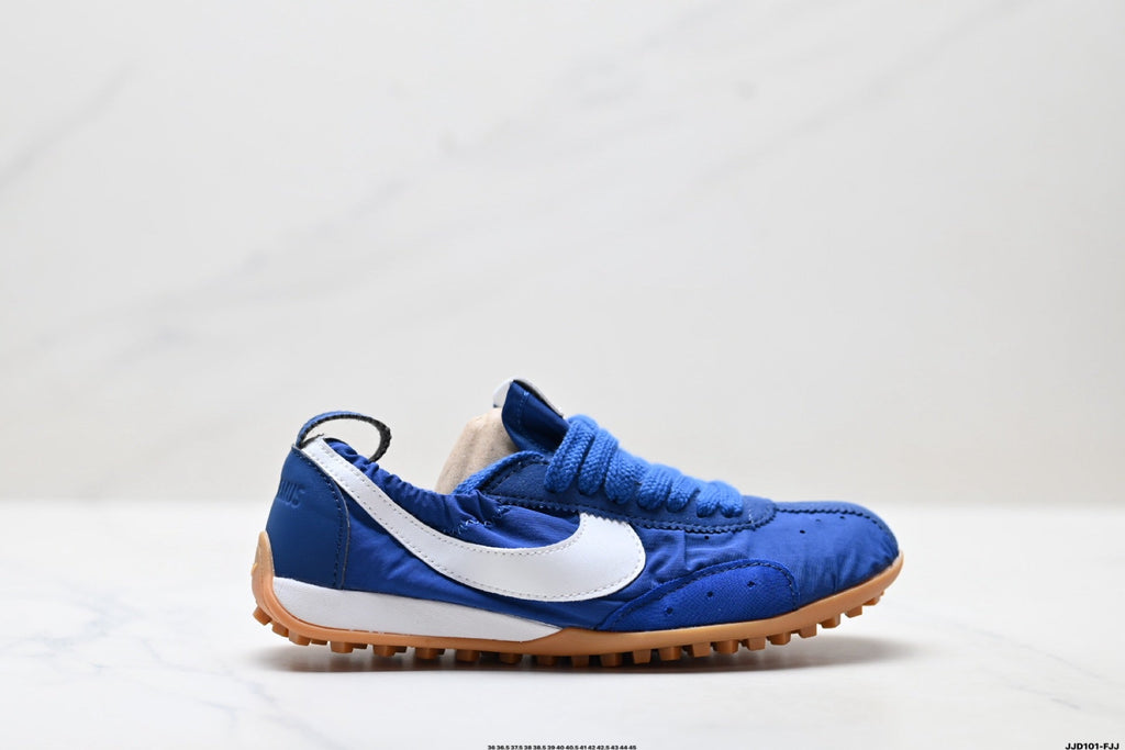 Jacquemus x Nike Jacumoon Low-Top Sneakers, in Blue and White - product image from the listing.