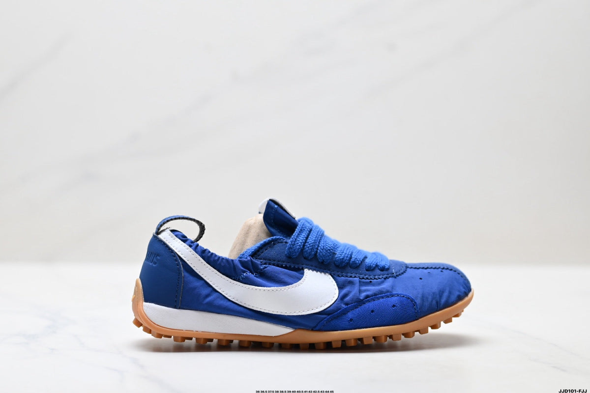 Jacquemus x Nike Jacumoon Low-Top Sneakers, in Blue and White - product image from the listing.