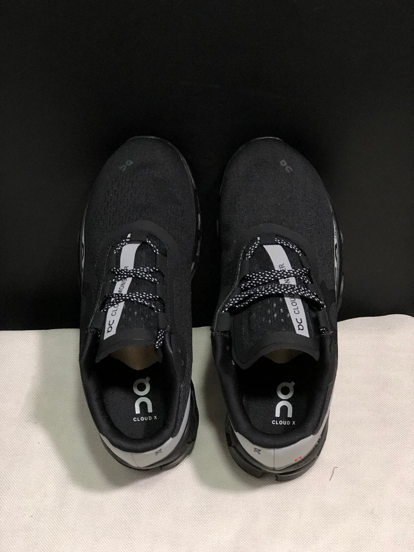 Black and Silver On Cloud X Sneakers - product image from the listing.