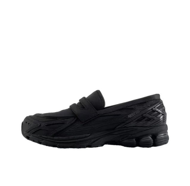 New Balance U1906LBN Black Slip-On Trainers - product image from the listing.